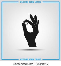Pill in the hand icon vector illustration eps10.