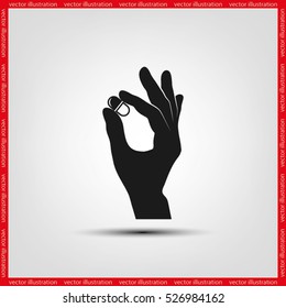 Pill in the hand icon vector illustration eps10.