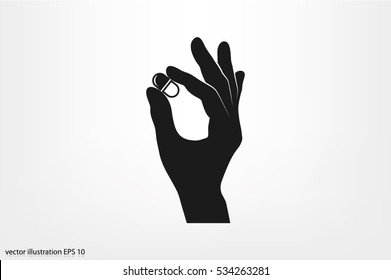 Pill in the hand icon vector illustration eps10
