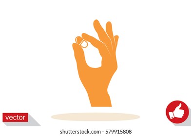 Pill in the hand icon vector illustration eps10.