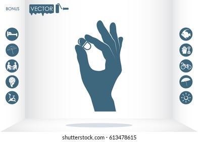 Pill in the hand icon vector illustration eps10.