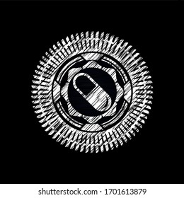 pill icon drawn on a blackboard