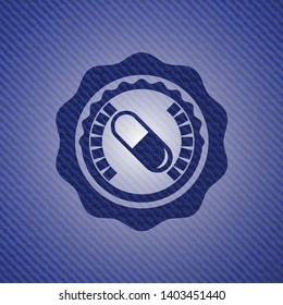 pill icon inside badge with denim texture