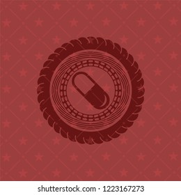 pill icon inside badge with red background
