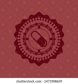 pill icon inside badge with red background