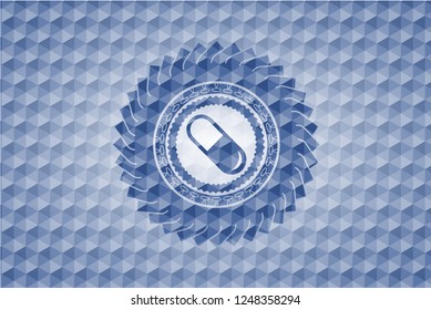 pill icon inside blue badge with geometric pattern.