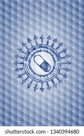 pill icon inside blue emblem with geometric background.