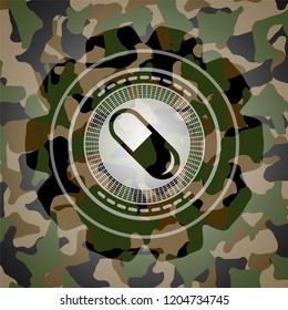 pill icon inside camouflage texture
