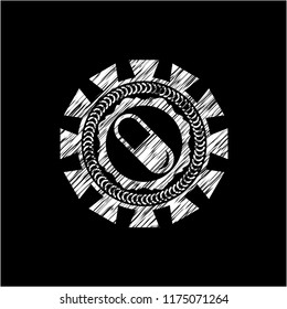 pill icon inside chalkboard emblem on black board