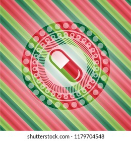 pill icon inside christmas style badge..