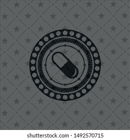 pill icon inside dark badge