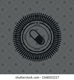 pill icon inside dark badge or emblem