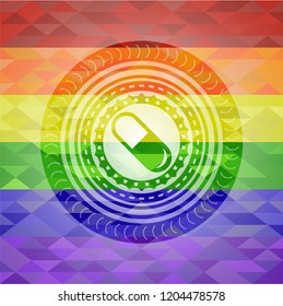 pill icon inside emblem on mosaic background with the colors of the LGBT flag