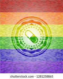 pill icon inside emblem on mosaic background with the colors of the LGBT flag