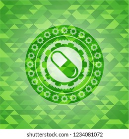 pill icon inside green emblem. Mosaic background