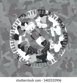 pill icon inside grey camouflage emblem