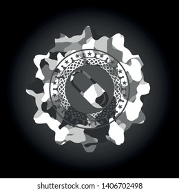 pill icon inside grey camouflaged emblem