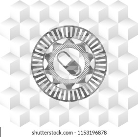 pill icon inside grey emblem with geometric cube white background