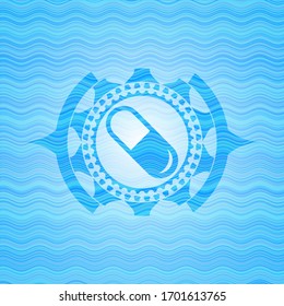 Pillensymbol auf hellblauem Hintergrund der Wasserwelle.