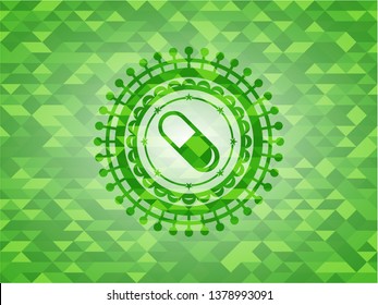 pill icon inside realistic green mosaic emblem