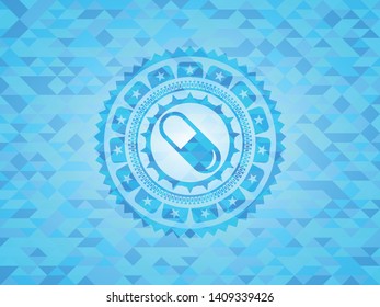 pill icon inside realistic light blue mosaic emblem