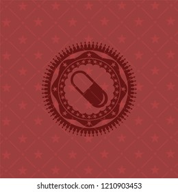 pill icon inside realistic red emblem