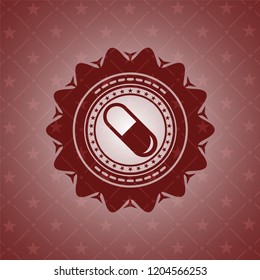 pill icon inside red emblem