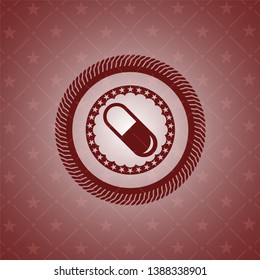 pill icon inside red emblem