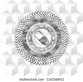 pill icon inside retro style grey emblem with geometric cube white background