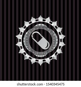 pill icon inside silver badge or emblem