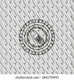 pill icon inside silver color emblem. Scales pattern. Vector Illustration. Detailed. 