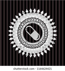 pill icon inside silver emblem