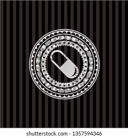pill icon inside silver emblem or badge