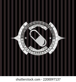 icono de píldora dentro del emblema brillante plateado. 
