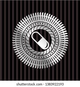 pill icon inside silvery badge or emblem