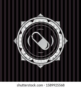 pill icon inside silvery shiny badge