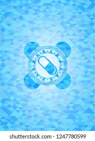 pill icon inside sky blue emblem with mosaic background