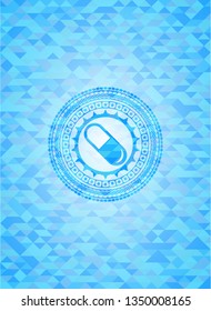 pill icon inside sky blue mosaic emblem