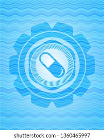 pill icon inside water wave concept style emblem.