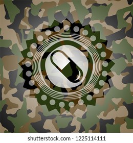 pill icon on camo pattern