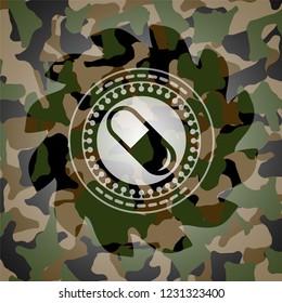 pill icon on camo pattern
