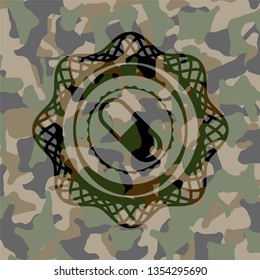 pill icon on camo pattern