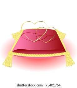 pillow and two golden hearts