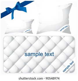 pillows and mattress with blue bow