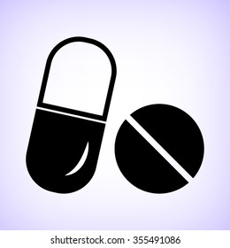 Pills -  black vector icon
