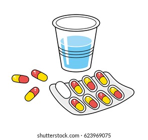 Pills in blister pack and glass of water isolated.
