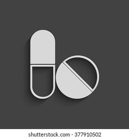 pills and capsules vector icon with shadow