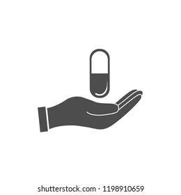 Pills in hand icon. Vector illustration, flat design.