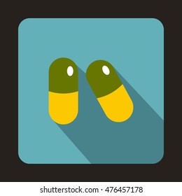 Pills icon in flat style on a baby blue background