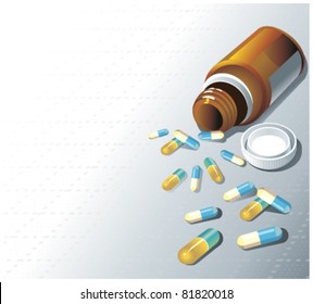 Pills spilling out of pill bottle isolated